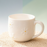 Cream Embossed Daisy Ceramic Mug