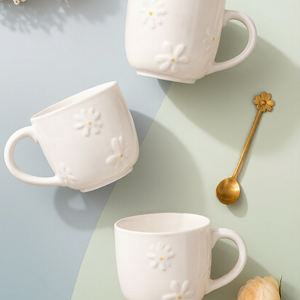 Cream Embossed Daisy Ceramic Mug